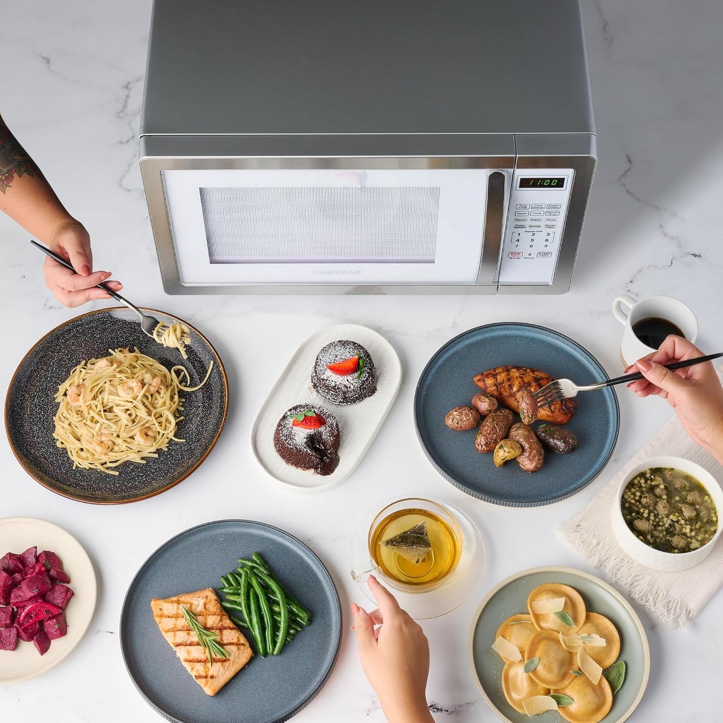 Farberware Countertop Microwave 1000 Watts, 1.1 cu ft - Microwave Oven With LED Lighting and Child Lock - Perfect for Apartments and Dorms - Easy Clean Stainless Steel